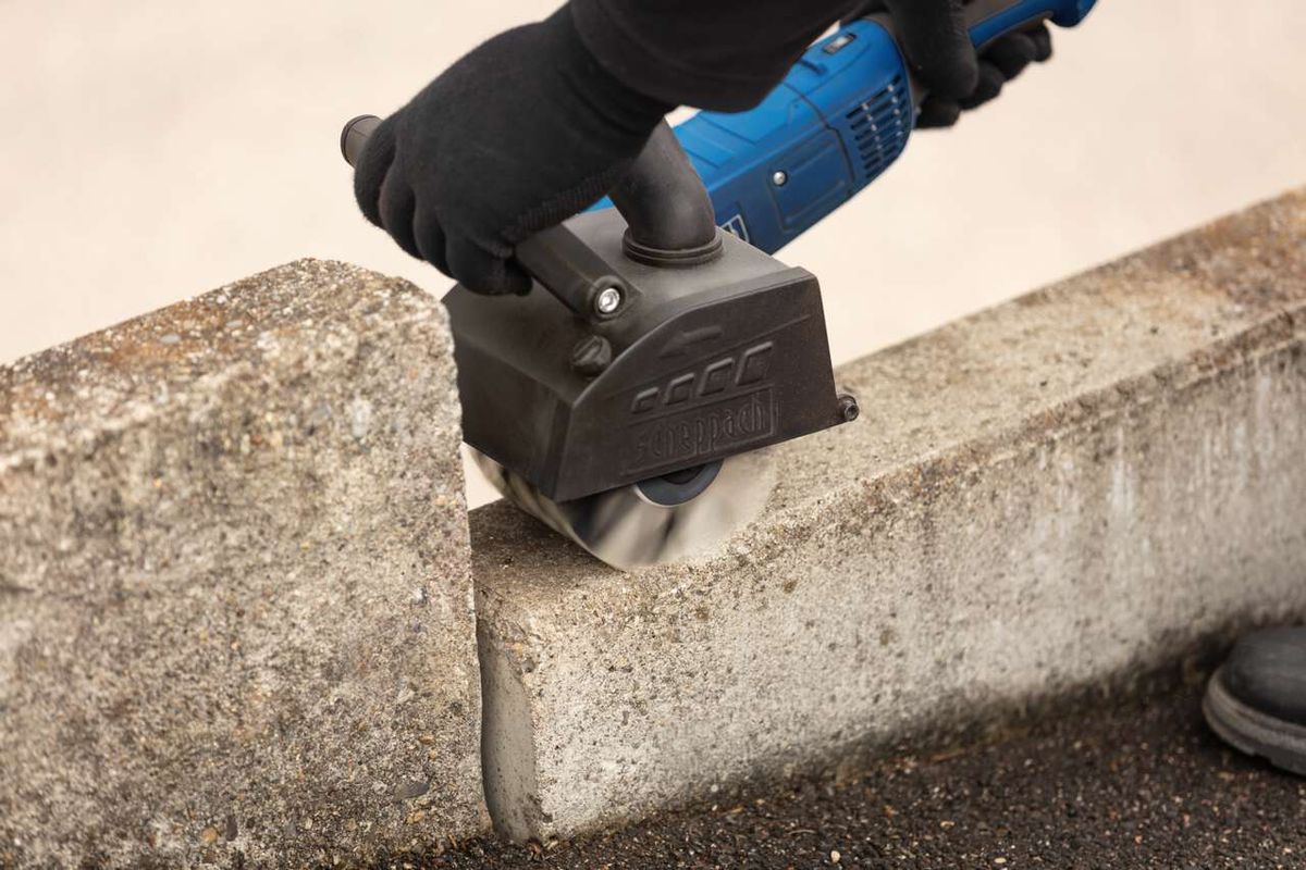 Scheppach plastic fiber brush in use with attached tool