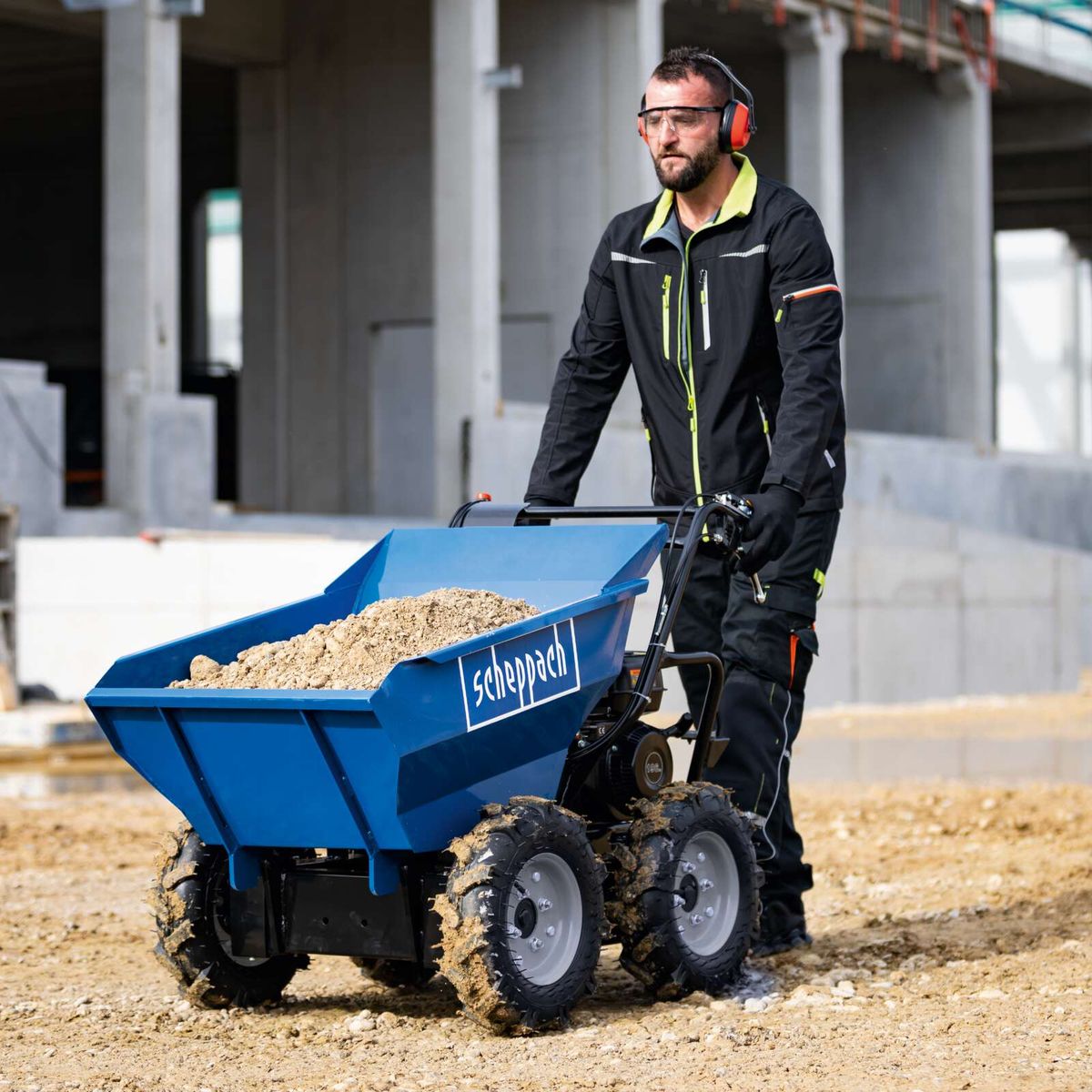 Scheppach dumper with tiltable container, all-terrain drive, forward/backward gears for material transport.