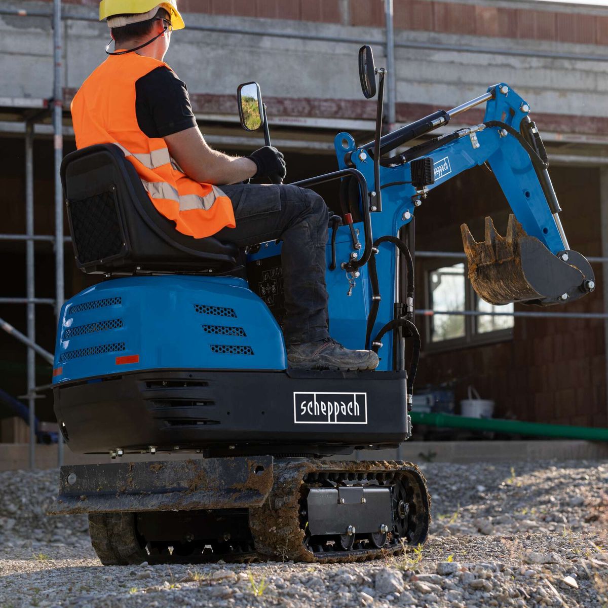 Scheppach Mini Excavator EXC815 with chain drive, 8.5 PS, 2330 mm reach, 690 mm track width, operational setup visible