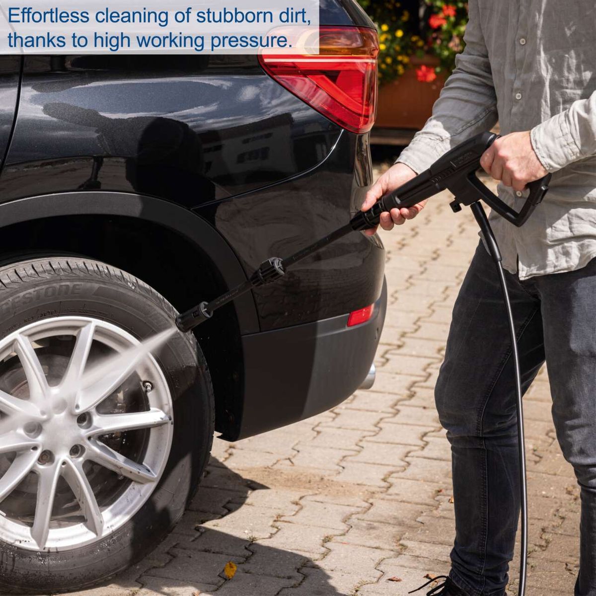 High-pressure cleaner demonstrating effortless cleaning of stubborn dirt with high-pressure action