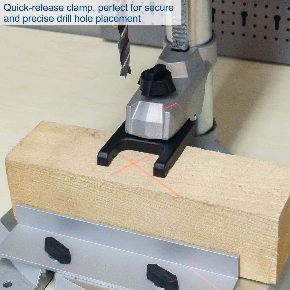 Bench pillar drill with quick-release clamp for secure and accurate drilling positions