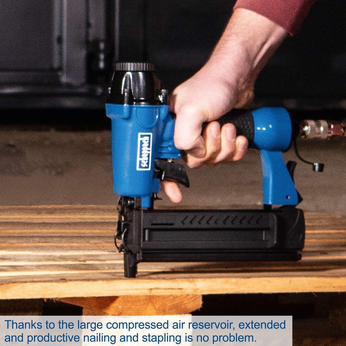 Scheppach air compressor featuring a large compressed air reservoir for extended nail and staple operation