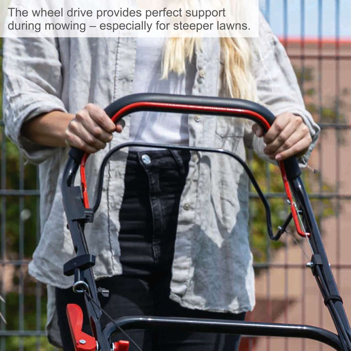 Self-propelled lawnmower with wheel drive supporting mowing, especially on steep lawns