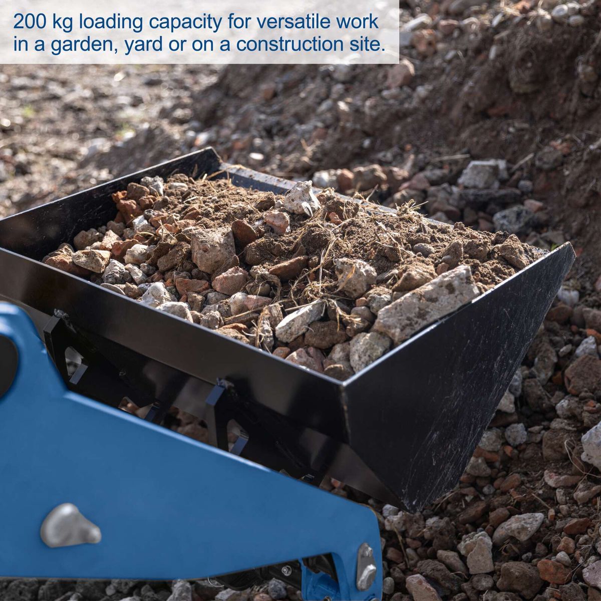 Compact loader with 200 kg load capacity, featuring a ball head and grab bucket for versatile outdoor use