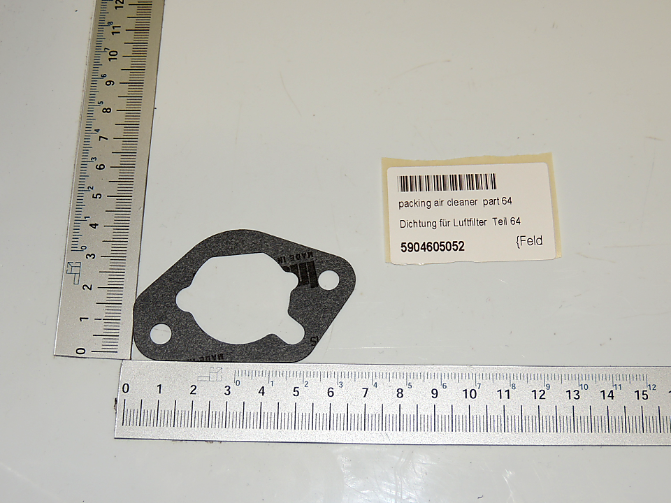 Air cleaner packing gasket with 'Part 64' marking and hole pattern