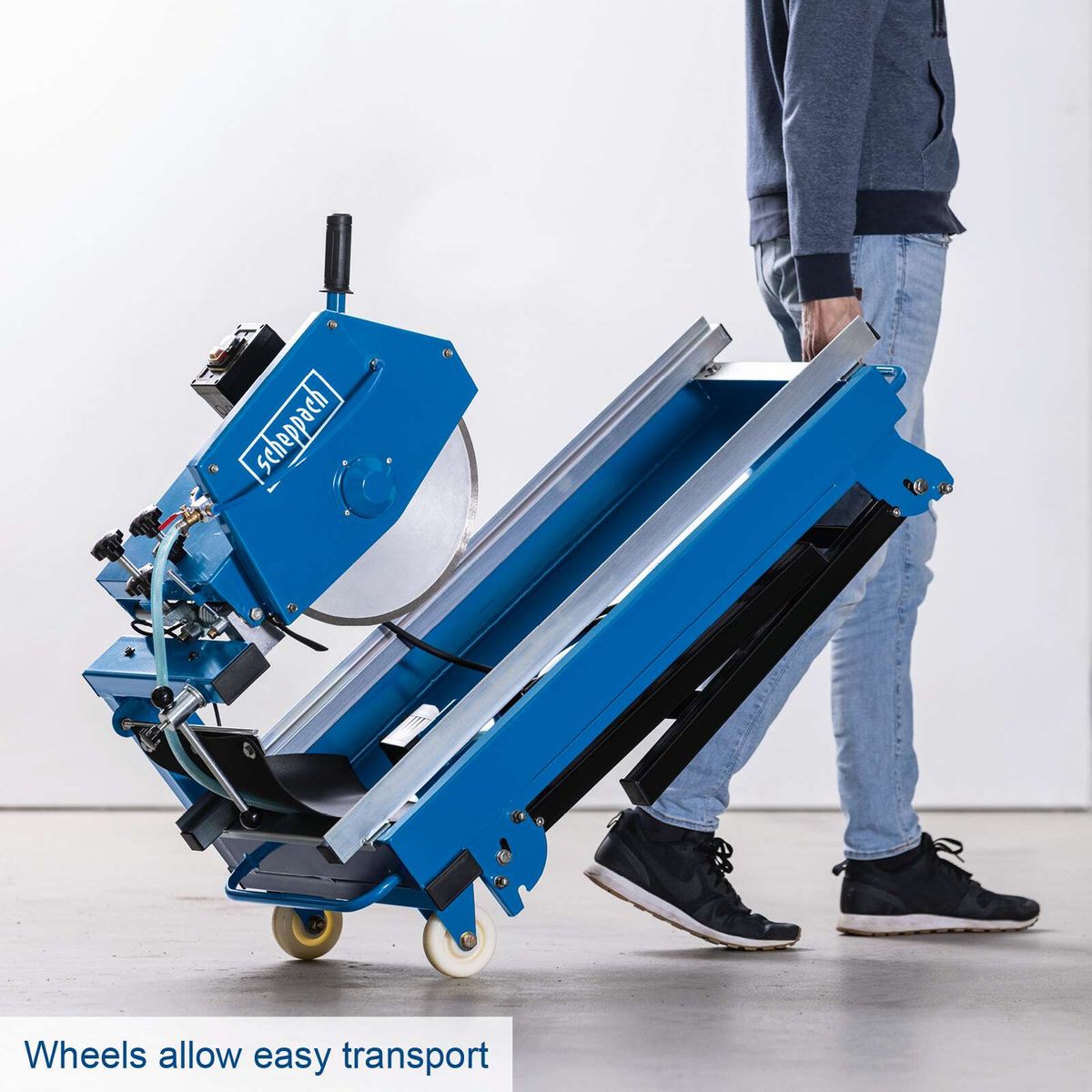 Stone and tile cutter with wheels for easy transport and handling