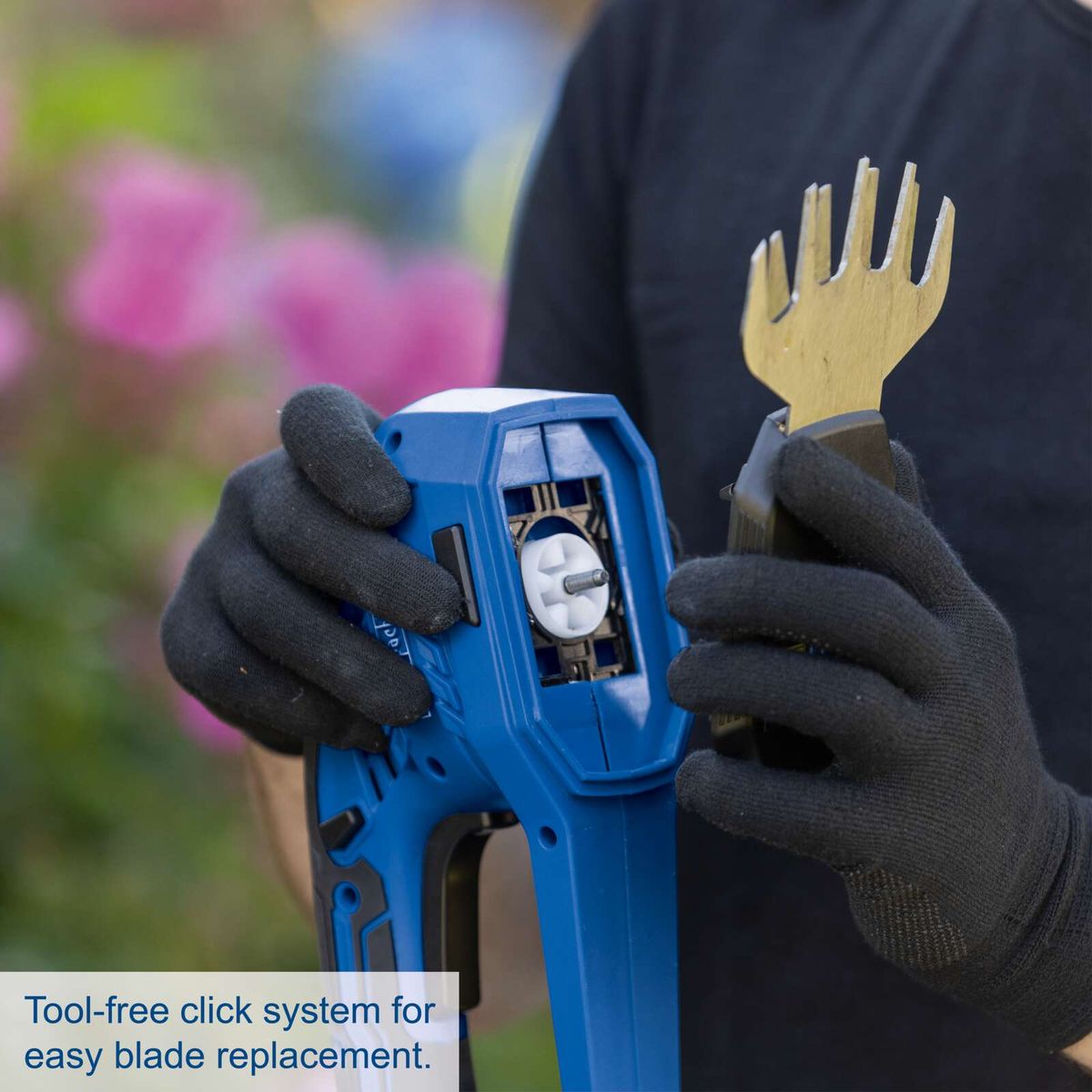 Tool-free click system for easy blade replacement on cordless grass and hedge trimmer