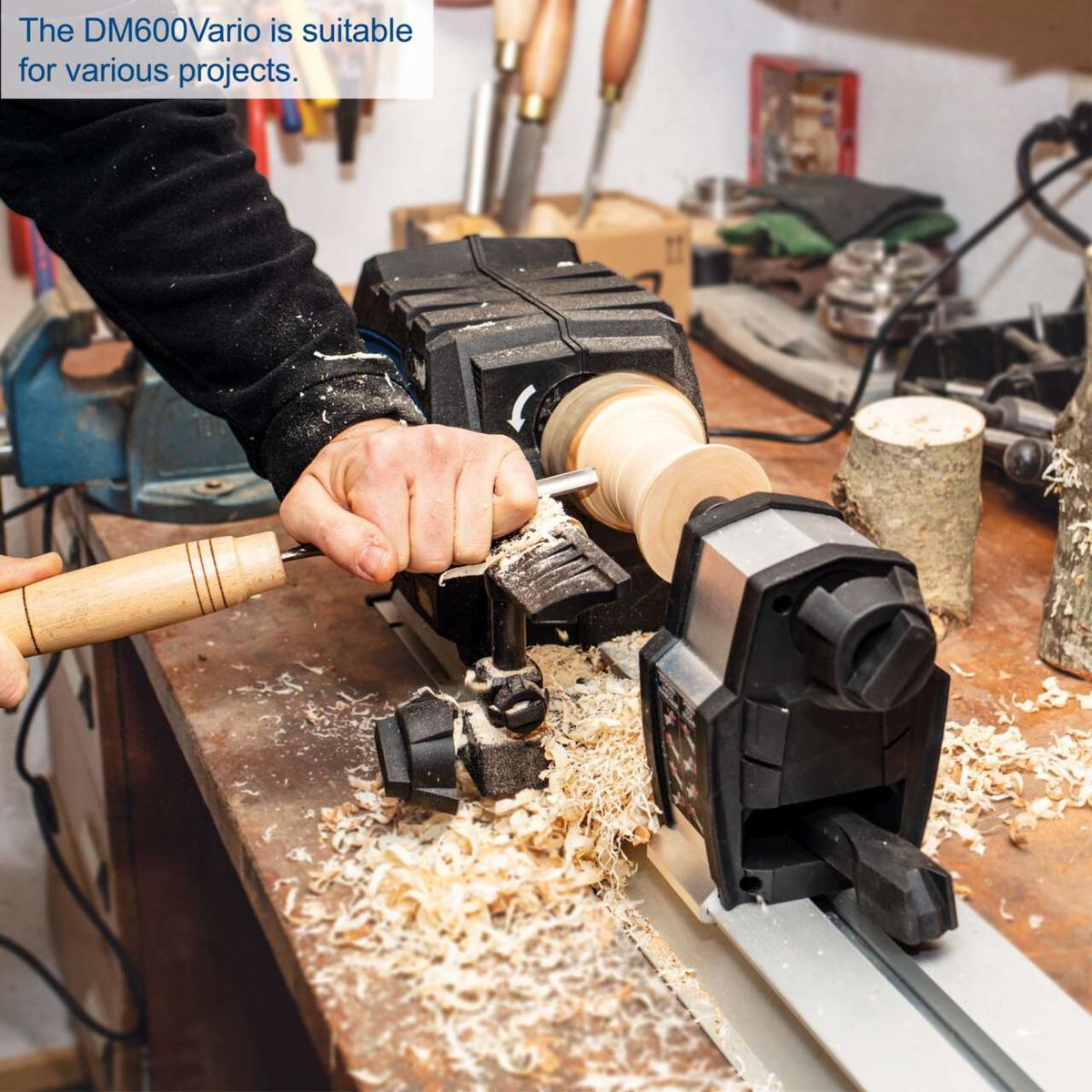 Wood lathe with spindle and workpiece clamp for Scheppach DM600VARIO, wood shavings visible