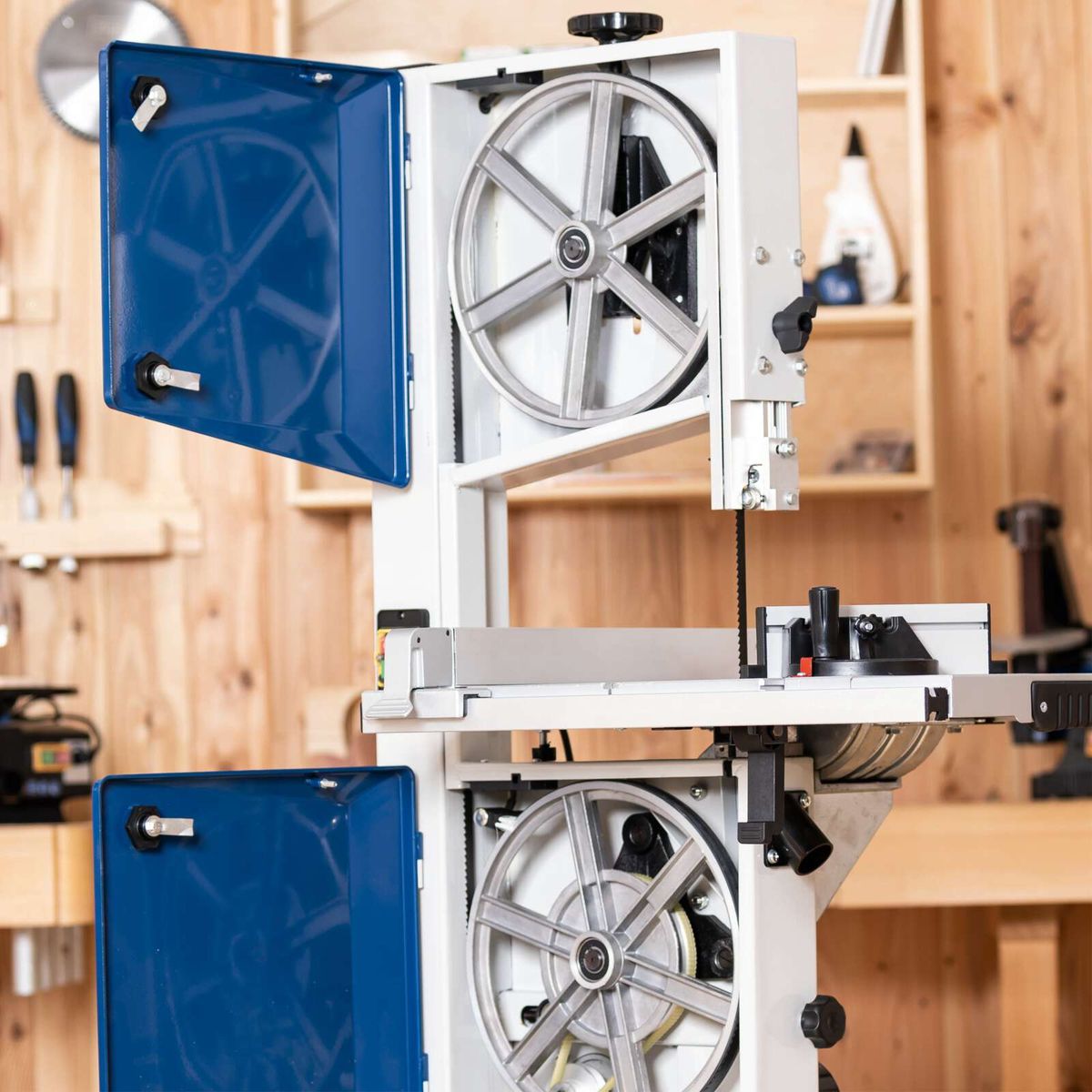 Bandsaw with tilting table and mitre gauge for accurate cuts