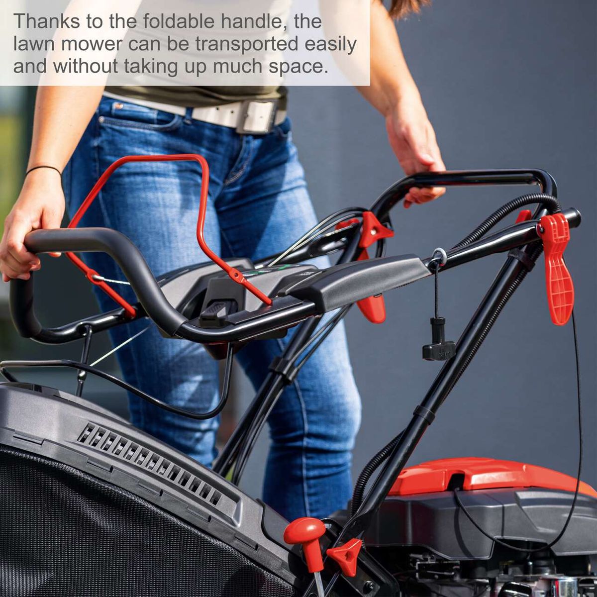 Foldable handle for easy transport and compact storage of a Scheppach lawnmower