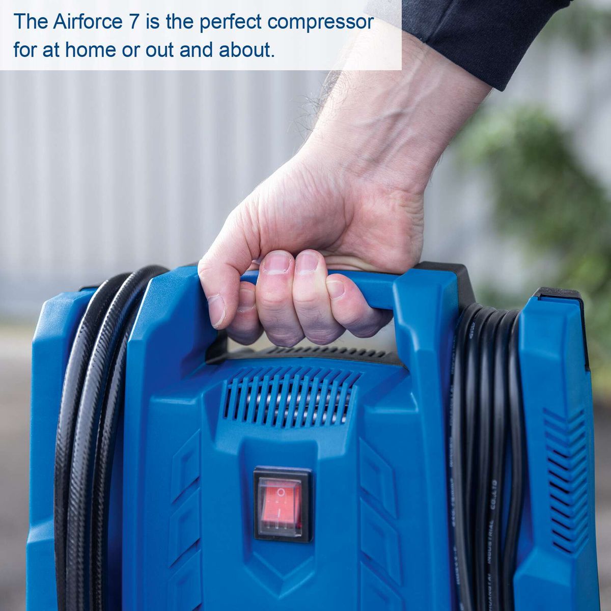 Portable air compressor with integrated tyre inflator and air pistol, featuring a mobile design