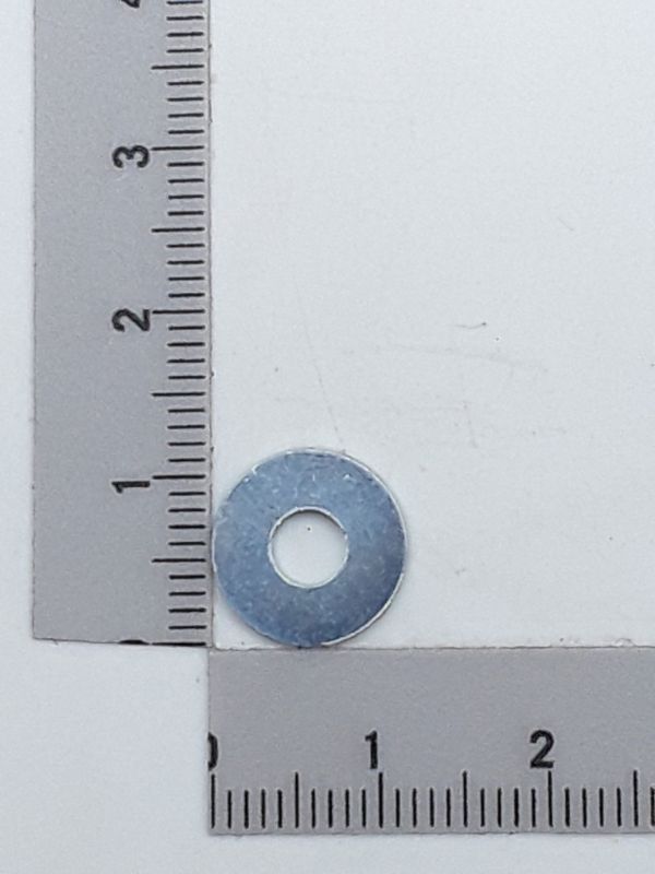Round plate with central hole, part of a Scheppach tool set
