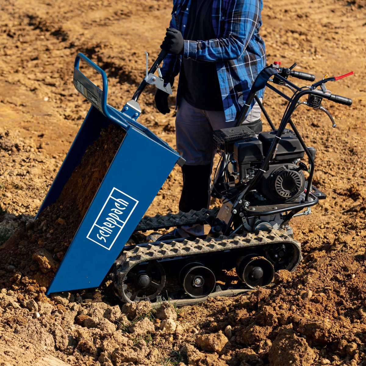 Scheppach dumper with extendable arm for material transport, mechanical drive system, sturdy construction