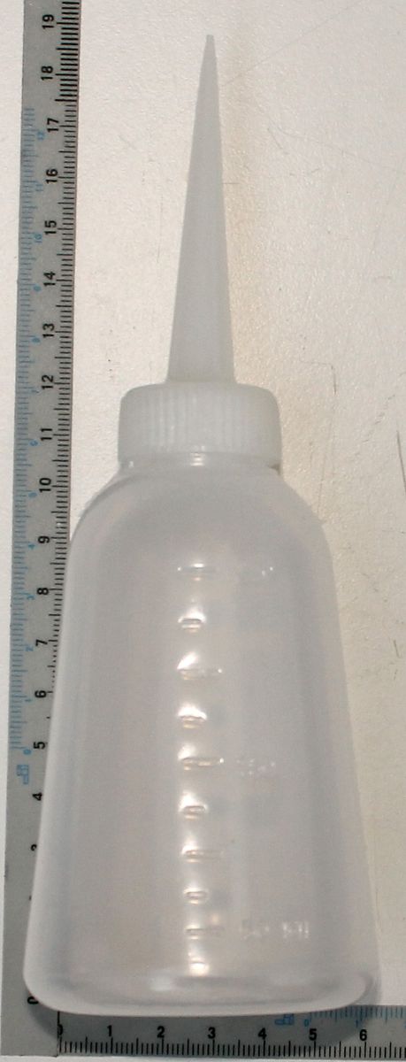 250 ml oil bottle with applicator, measuring scale included