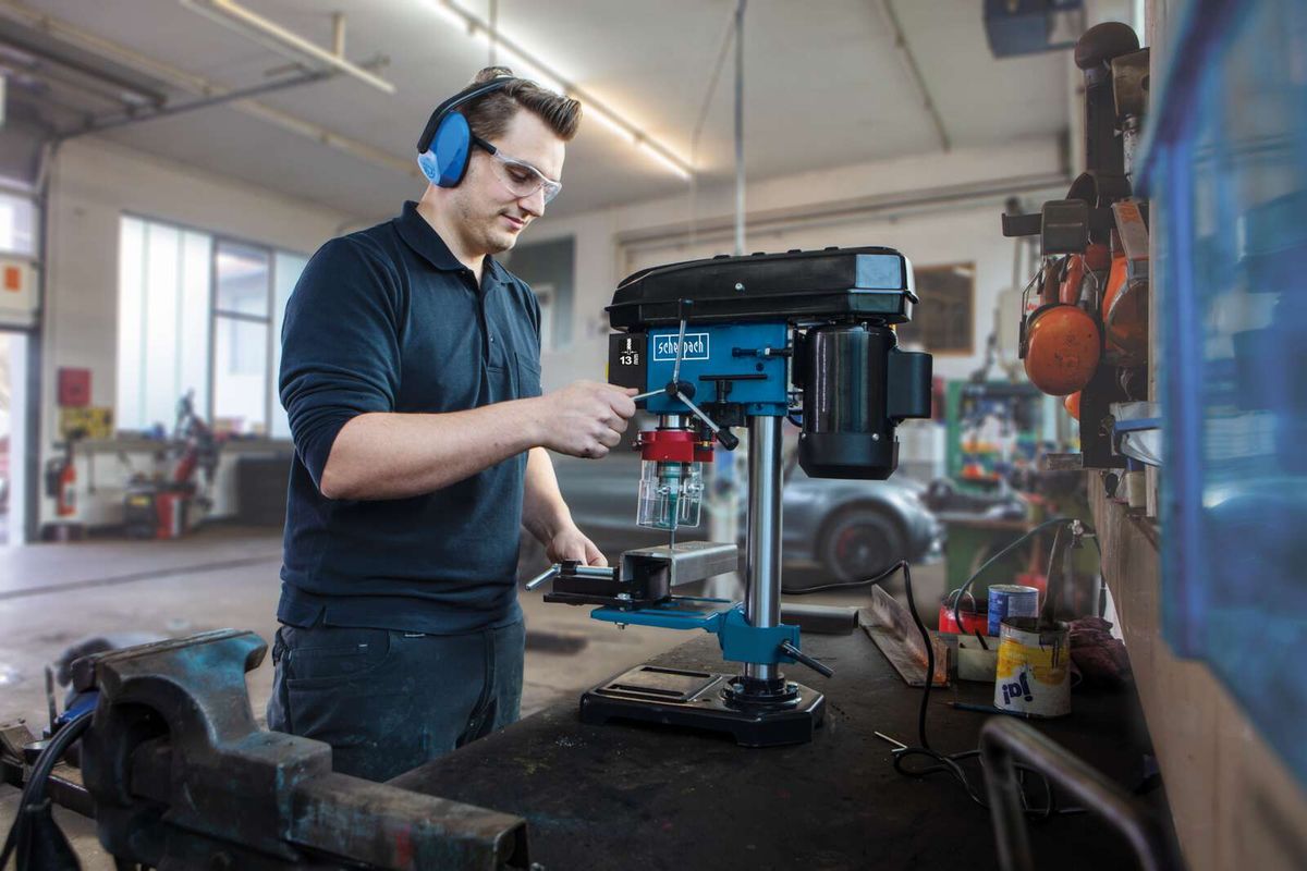 Scheppach bench pillar drill with laser alignment in workshop setting