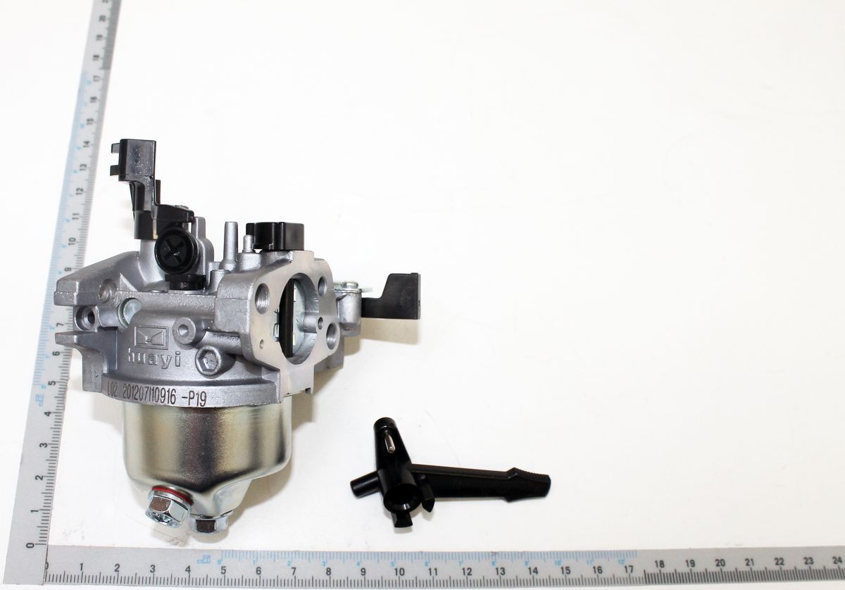 Carburetor with fuel inlet and attached filter, marked 'HUAYI L02 - P19'