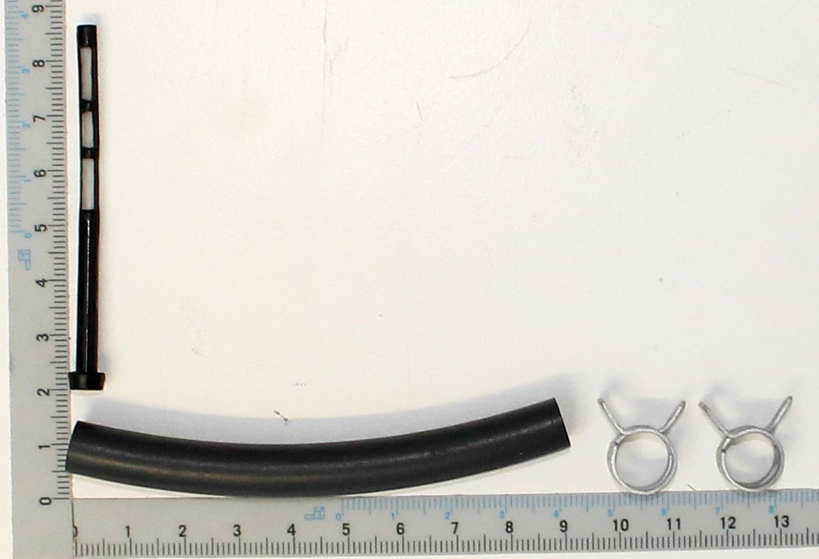 A fuel pipe with two metal clamps and a ruler for size reference. The pipe is approximately 90 cm long with an outer diameter of 10 mm. The clamps are used to secure the pipe.