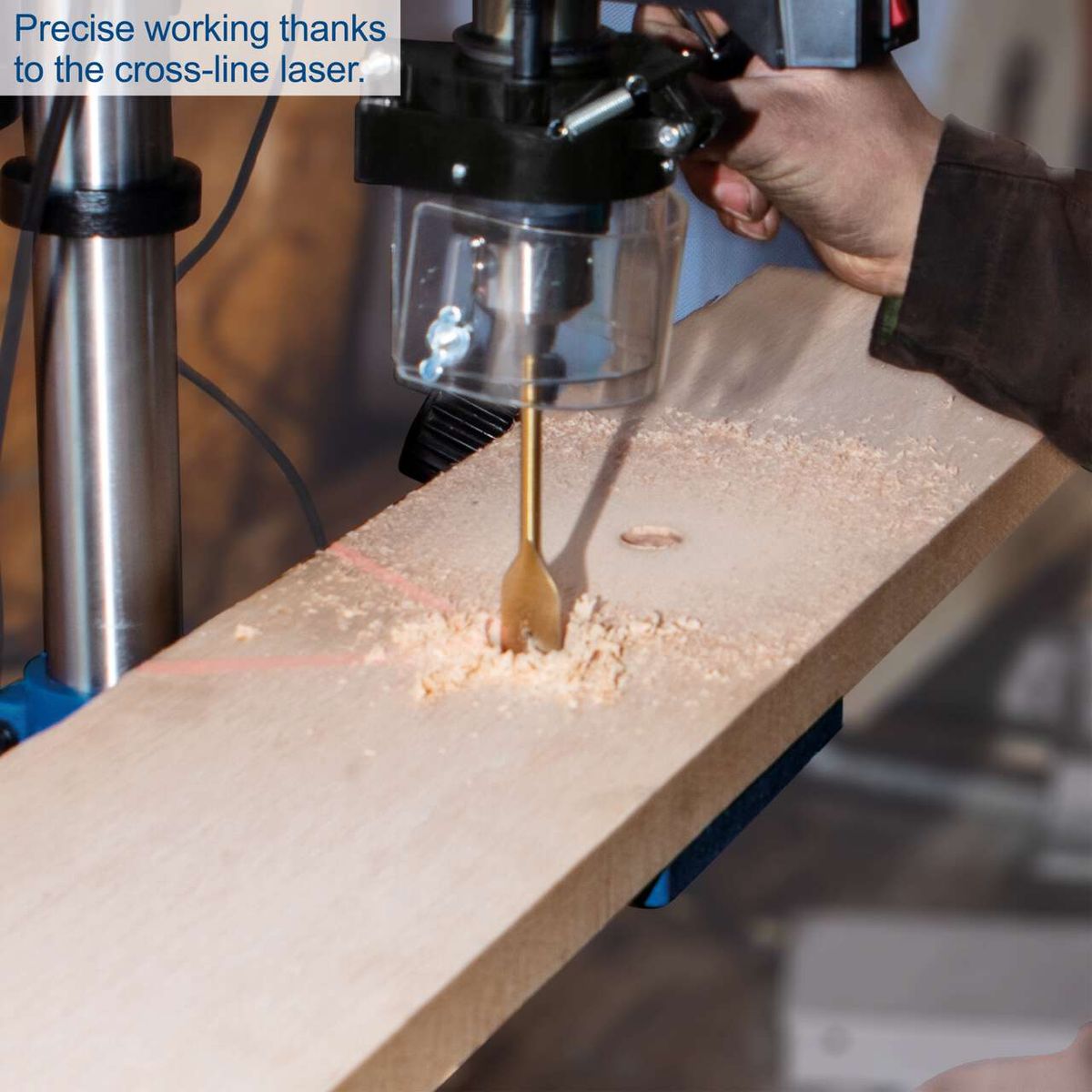 Bench pillar drill with cross-line laser guiding during wood drilling