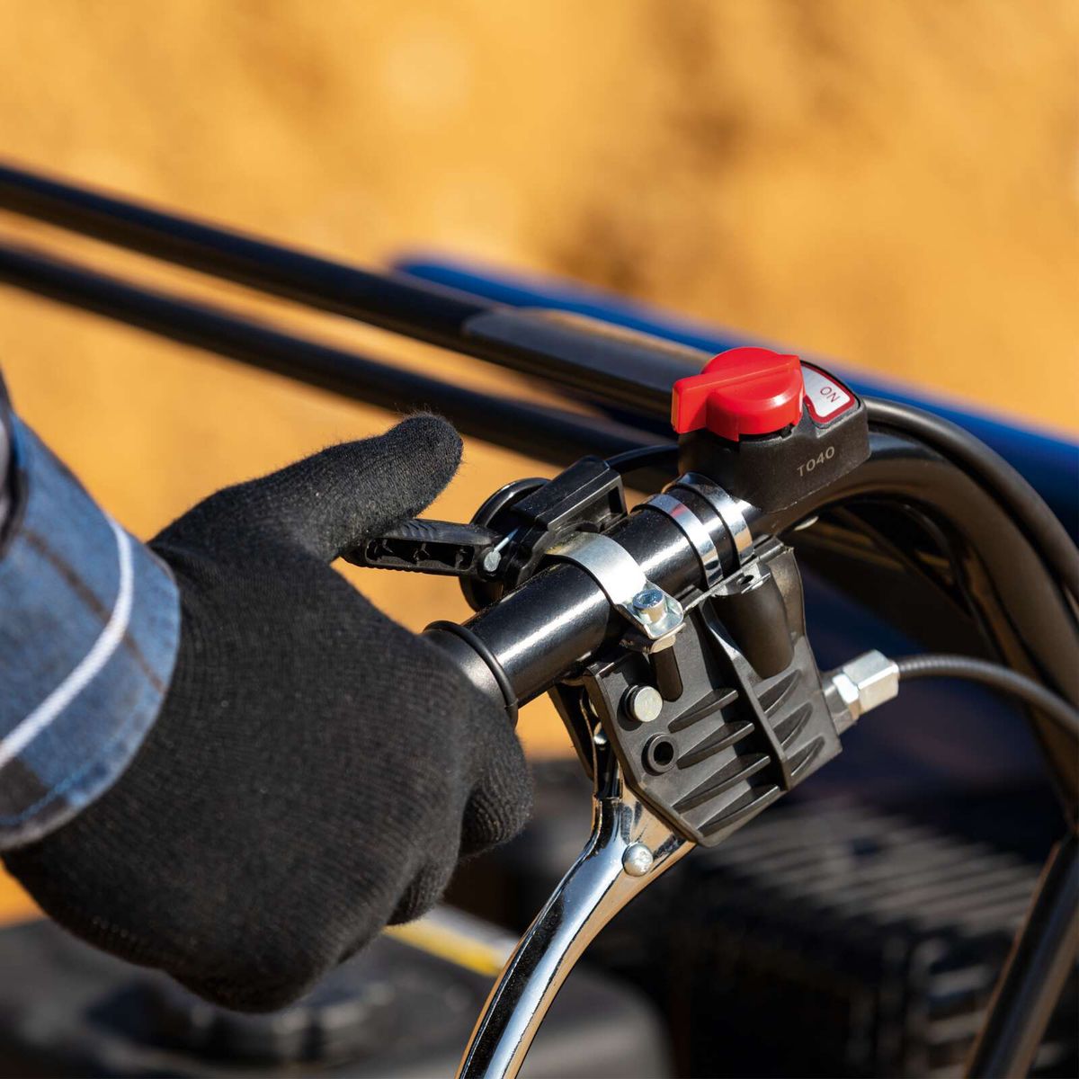 Scheppach dumper handle with safety and adjustment mechanism for precise control