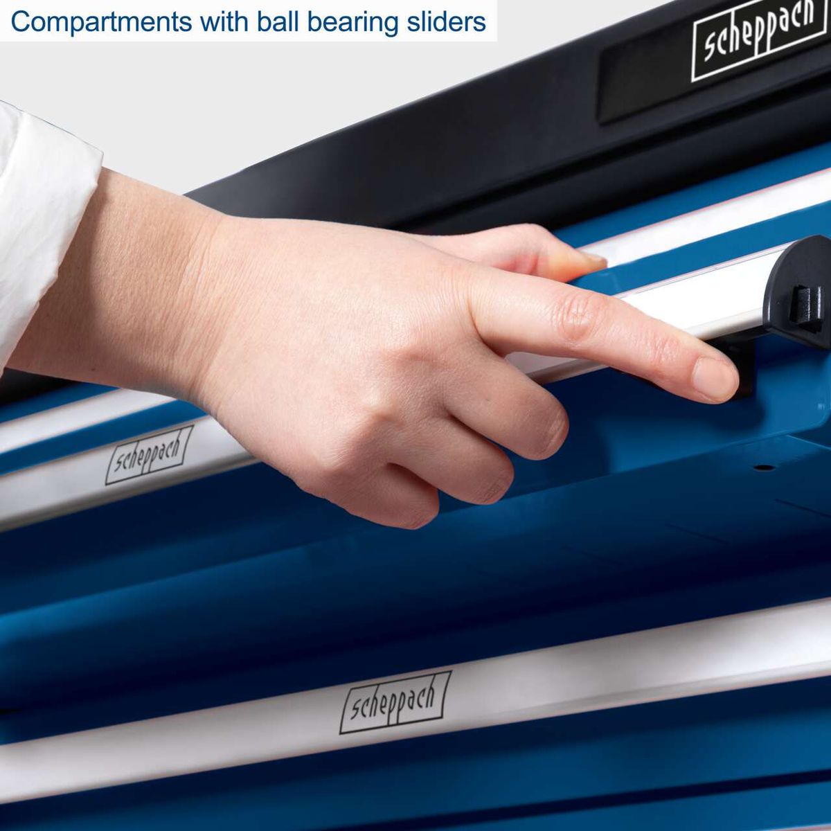 Workshop trolley featuring sliding compartments with ball-bearing slides