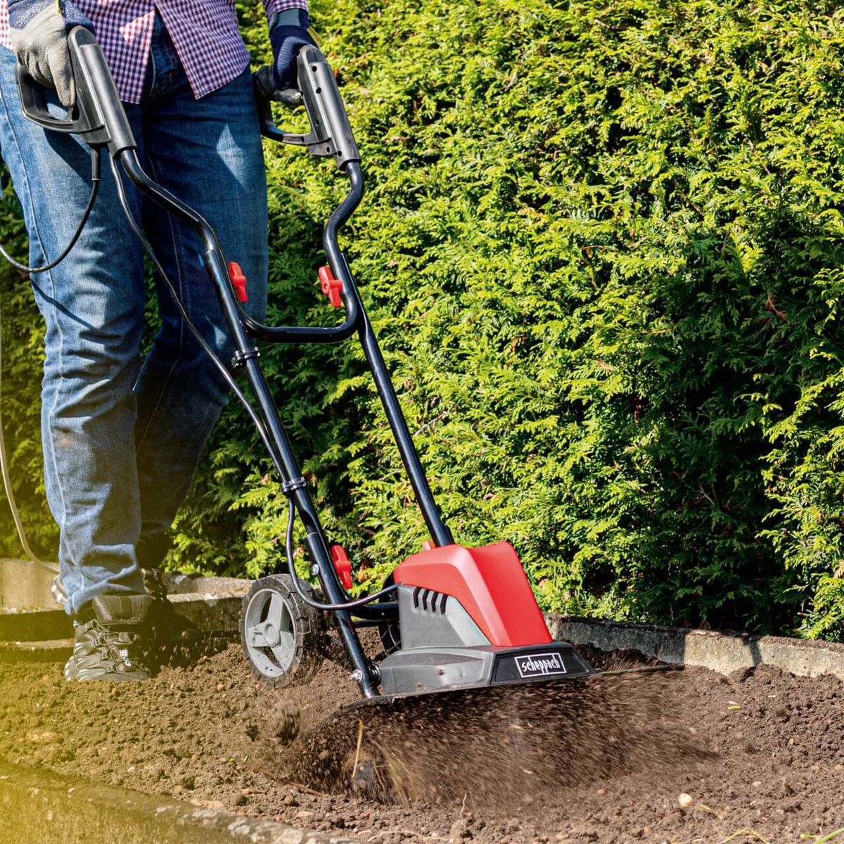 Electric tiller with 450mm width and 220mm depth for gardening, featuring soft-start mechanism