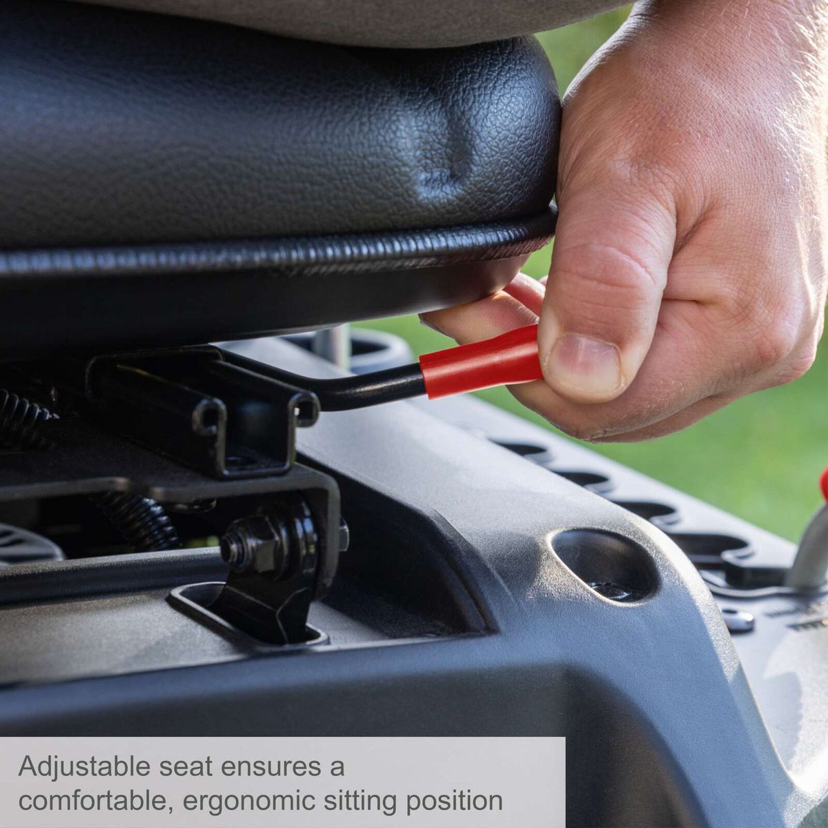 Adjustable seat for ergonomic and comfortable riding position on the lawnmower