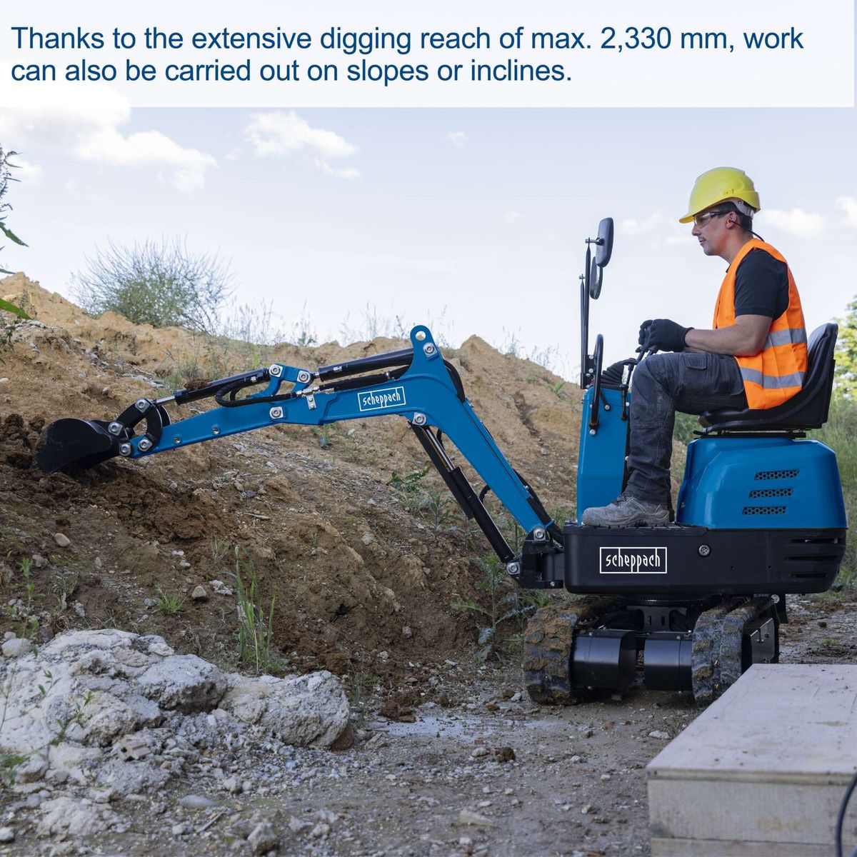 Compact mini excavator with 2,330 mm reach for sloped terrain work