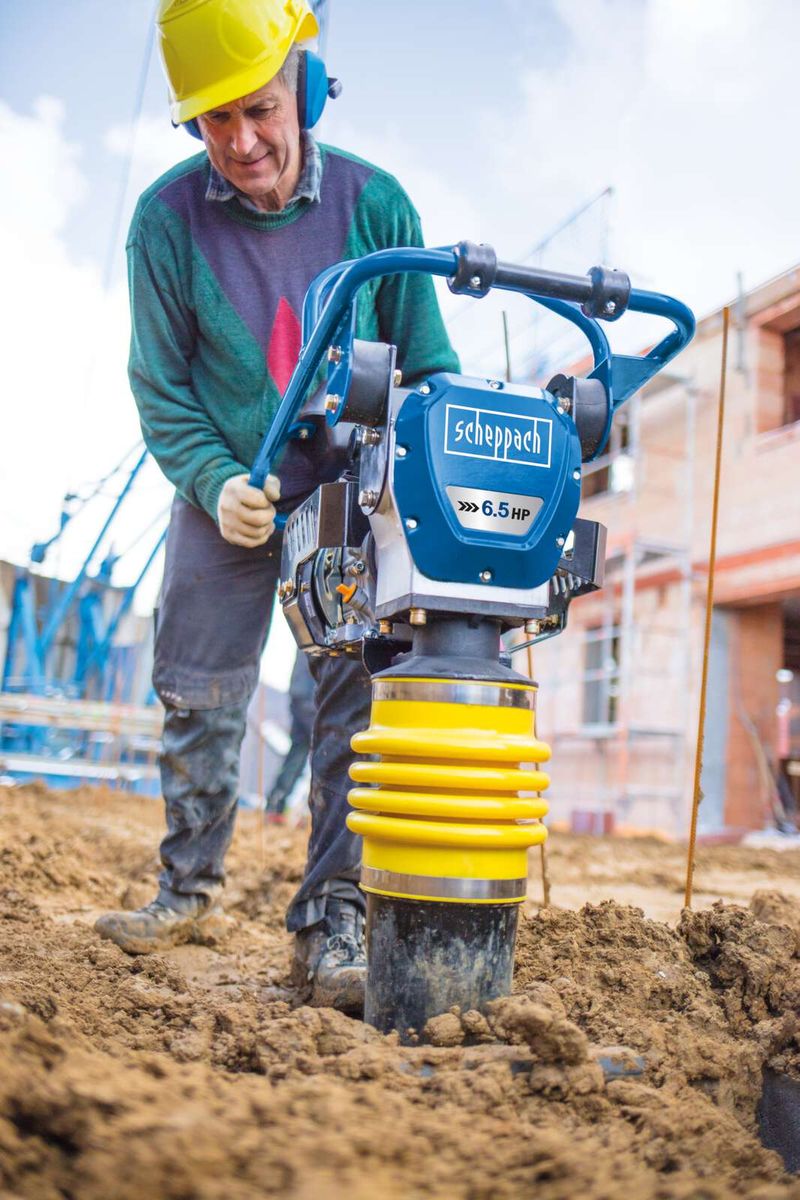 Scheppach petrol-powered vibrating tamper with transport wheels, construction site use