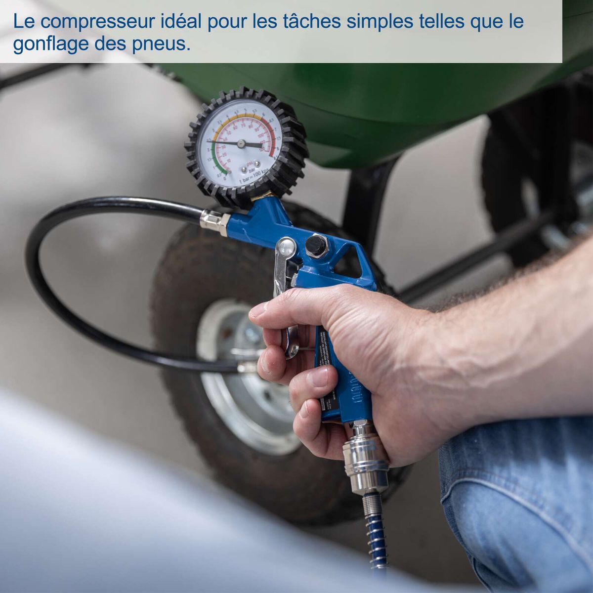 Hand-operated air compressor with gauge for pneumatic tasks